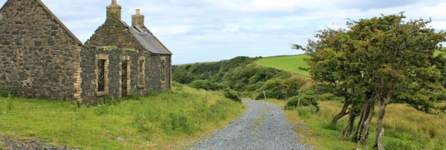 17 track to Currarie Port, Ruth hiking the Ayrshire Coastal Path, Scotland