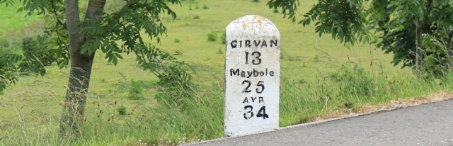 39 old milestone, Ballantrae, Ruth hiking the Ayrshire Coastal Path, Scotland