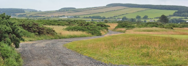 39 track through Turnberry golf course, Ruth hiking the Ayrshire Coastal Path, Scotland