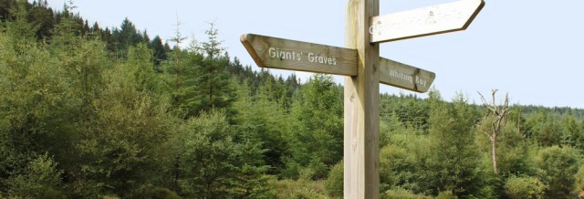 09 signpost to Giants Graves, Ruth hiking in Arran