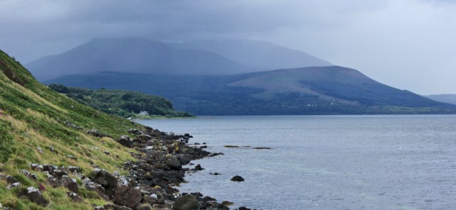 15 rain over Goat Fell, Ruth hiking the Arran Coastal Way, Scotland
