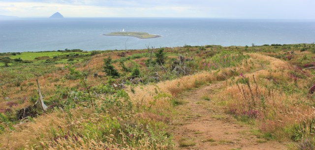 26 footpath down to Kildonan, Pladda Island, Ruth hiking the coast of Arran