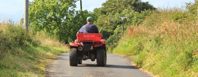 27 farmer on a quad bike, Ruth Livingstone walking the Scottish Coast