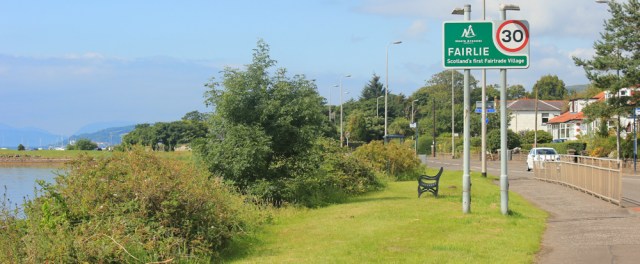 39 Fairlie fairtrade village sign, Ruth hiking the Ayrshire Coastal Path, Scotland