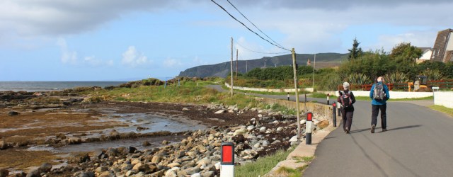 03 walking towards Auchenhew, Ruth on the Arran Coastal Way, Scotland