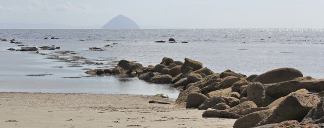 22 Ailsa Craig, from Kilmory beach, Ruth hiking around Arran