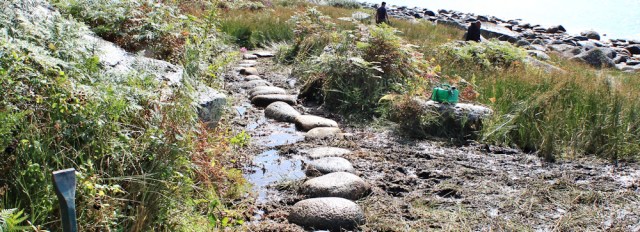 29 mud and stepping stones, Ruth hiking the Arran Coastl Way