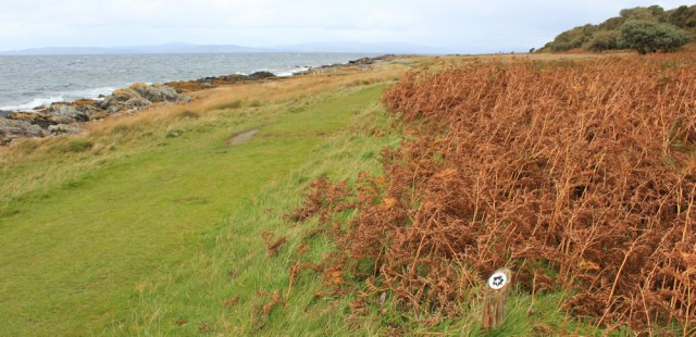14 beyond Newton Point, Ruth hiking around the shore of Arran