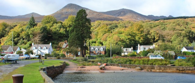 14 Harbour near Corrie, Ruth hiking the coast of Arran, Scotland
