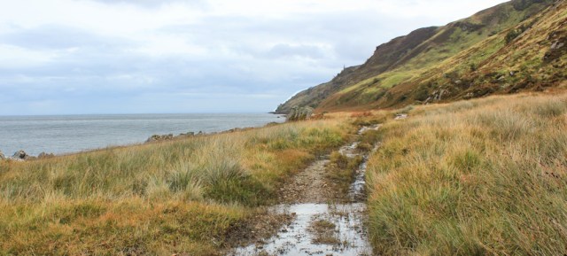 33 track, Ruth hiking the north coast of Arran