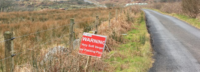 08 warning soft verges, Ruth hiking Scottish roads