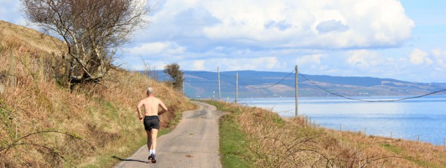 14 runner on the road, Ruth hiking the Kintyre Way
