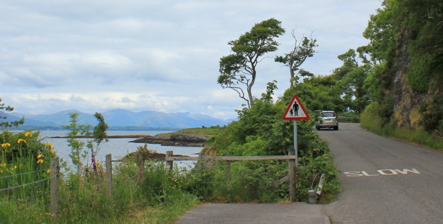 16 coast road to Ganavan Bay, Ruth walking the coast of Scotland