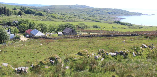 22 looking down on Kilmory, Ruth hiking the Scottish coast