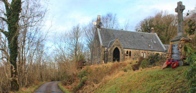 18 church and memorial cross, Ruth hiking the coast of Morvern Peninsula