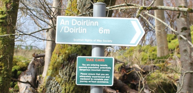 30 sign to Doirlinn, Ruth hiking the coast of Morvern Peninsula