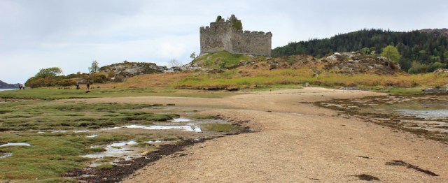 33 causeway to the castle, Ruth walking towards CastleTioram. Doirlinn, Scotland