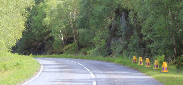 32 line of cones, Ruth walking up Loch Ailort, Scotland