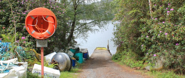 43 mysterious jetty, Ruth walking up Loch Ailort, Scotland