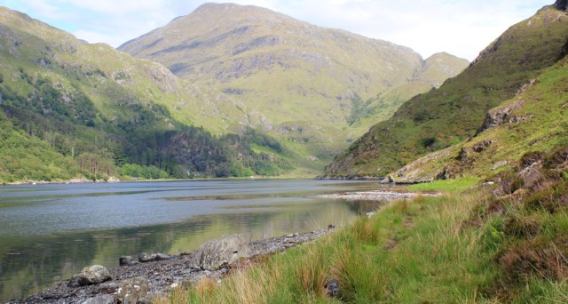 52 near the top of Loch Hourn, Ruth walking the coast of Scotland