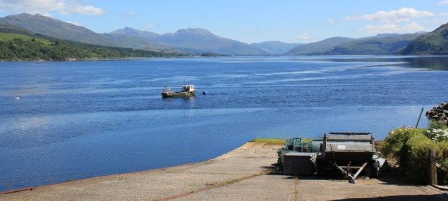 02 looking up the loch at Strome Ferry, Ruth walking the shore of Loch Carron