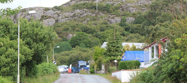 10 bus depot at edge of Kyle, Ruth walking the coast of the Scottish Highlands