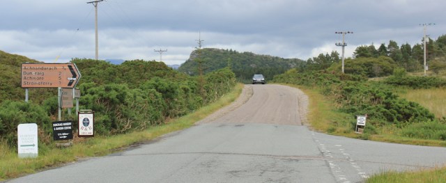 32 turnoff to Craig Highland Farm, Ruth walking the coast of the Scottish Highlands