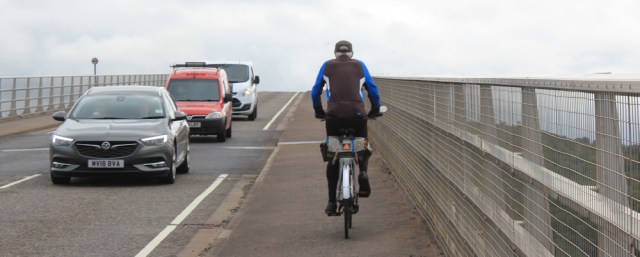 42 cyclist again, Ruth crossing Skye Bridge, coastal walk
