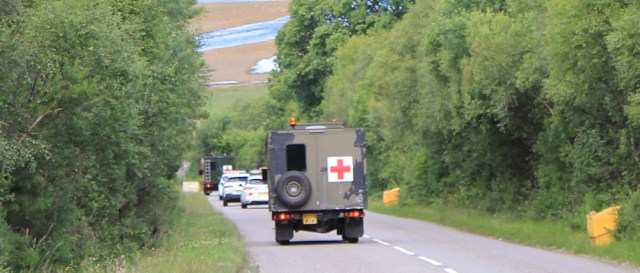 62 two more ambulances, Ruth walking the shore of Loch Carron