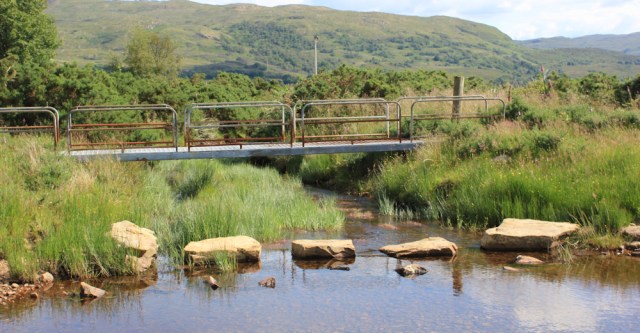 73 bridge or stepping stones, Ruth walking the shore of Loch Carron