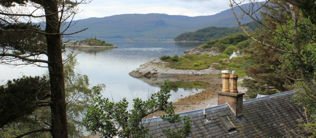 03 walking to the end of the road, Ardaneaskan, Ruth hiking round the coast of Scotland