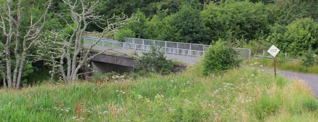 41 over the Abhainn Cumhang a Ghlinne river, Wester Ross, Ruth hiking around the coast of the Scottish Highland