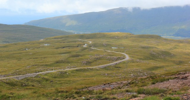 54 road winding ahead, walking down to Applecross, Ruth hiking the coast of Scotland