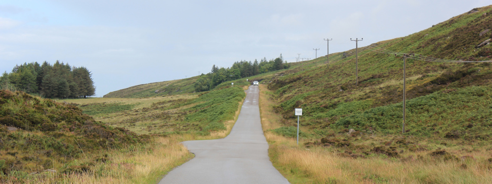 10 traffic on the coast road, Ruth hiking up the coast from Applecross, Scotland