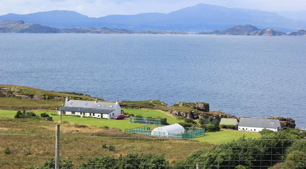 17 Londain and PO van, Ruth walking up the coast of Applecross, Scotland