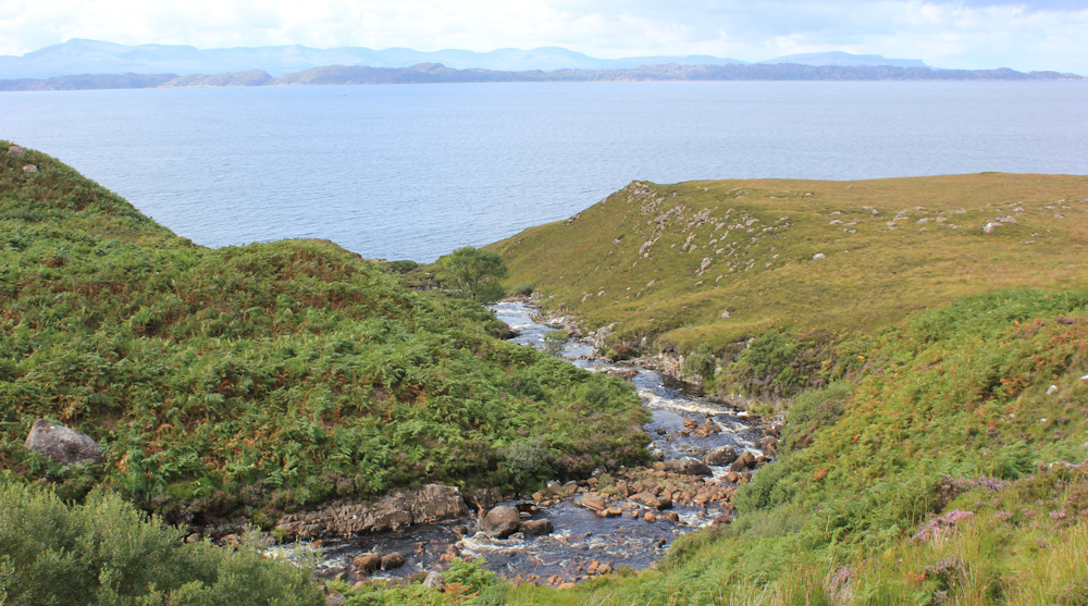 26 Allt an t-Strathain, Ruth walking up the coast of Applecross, Scotland