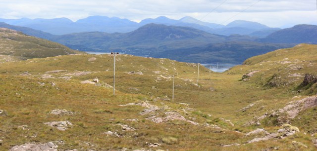 28 following telegraph poles down to the sea, Ruth hiking around Applecross, Scotland