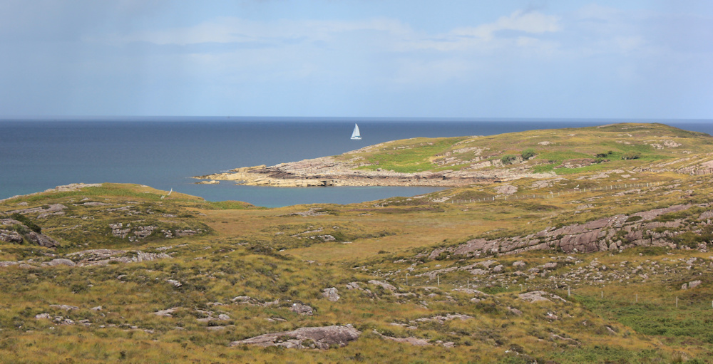 15 rain clouds and sailing boat, Rubha na Fearna, Ruth hiking around the north of Applecross, Scotland