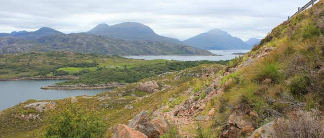 16 rocky path under the road, Ruth walking the south bank of Loch Torridon, Scotland